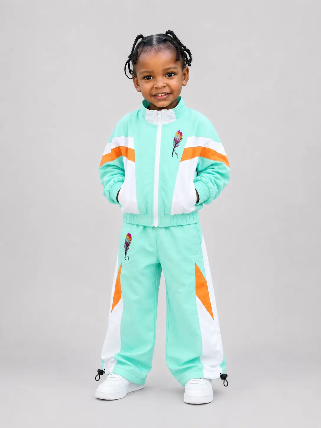 41795DD0-5C36-4F81-8A0D-B8FBBD2EE37A Kids Windbreaker Set with a clean, minimal design